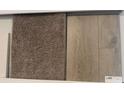 Sample of plush carpet and luxury vinyl flooring options for comfortable and stylish living spaces at 914 Agostino Dr., Myrtle Beach, SC 29579