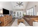 Inviting living room with vaulted ceilings, a cozy brown sofa, and decorative touches throughout at 1069 Williston Loop # 1069, Murrells Inlet, SC 29576