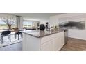 Modern kitchen featuring granite countertops, stainless steel appliances, and an open-concept design at 148 Leyland Cypress Dr, Conway, SC 29527