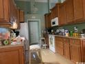 Traditional-style kitchen with wooden cabinets and modern appliances at 153 Highmeadow Ln., Aynor, SC 29511