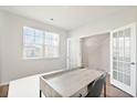 Bright home office space with desk and French doors at 2106 Ainsley Dr., Little River, SC 29566
