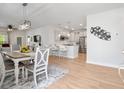 Open concept dining area and kitchen with ample seating and modern appliances at 5987 Tramonto St., Myrtle Beach, SC 29577