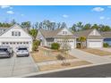 Charming single-story home with a two-car garage, manicured lawn and easy street access at 5987 Tramonto St., Myrtle Beach, SC 29577