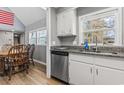 Well-lit kitchen featuring granite countertops, stainless steel appliances, and a dining area perfect for Gathering meals at 109 Clemson Rd., Conway, SC 29526