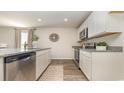 Bright kitchen featuring stainless steel appliances, granite countertops, and white cabinetry at 153 Leyland Cypress Dr, Conway, SC 29527
