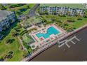 Stunning pool area with spa, deck chairs, and access to the waterway and docks at 2180 Waterview Dr. # 835, North Myrtle Beach, SC 29582