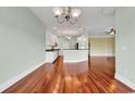 Spacious living room featuring hardwood floors, open floor plan and modern lighting at 249 Venice Way # 3301, Myrtle Beach, SC 29577