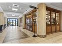 Elegant lobby area with tile flooring, stylish wooden accents, and a coffee shop for residents and guests at 1105 S Ocean Blvd. # 1134, Myrtle Beach, SC 29577