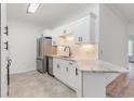 Modern kitchen featuring stainless steel appliances and granite countertops at 130 Lazy Willow Ln. # 204, Myrtle Beach, SC 29588