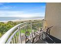 Relax on this balcony and enjoy ocean views with outdoor seating at 2106 N Ocean Blvd. # 410, Myrtle Beach, SC 29572