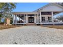 Inviting front entry with double doors, brick steps and a spacious covered porch at 161 Twelve Oaks Dr., Pawleys Island, SC 29585