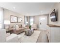 Relaxing living room featuring stylish decor, ample seating, and natural light at 2067 Nw Parow Ln Nw # C, Calabash, NC 28467