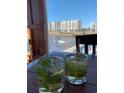 Waterfront building view with two mojitos in the foreground at 2180 Waterview Dr. # 421, North Myrtle Beach, SC 29582