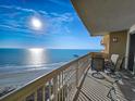 Balcony with outdoor seating offering stunning views of the ocean and beach at 8500 Margate Circle # 1604, Myrtle Beach, SC 29572