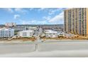 Stunning coastal aerial showcasing a mix of condos and hotels near the beach at 9620 Shore Dr. # C101, Myrtle Beach, SC 29572