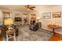 Inviting living room with comfortable sofas, patterned area rug, and natural light at 1105 Palmetto St., Georgetown, SC 29440