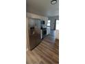 Modern kitchen featuring stainless steel appliances and sleek gray flooring at 134 Clovis Circle, Myrtle Beach, SC 29579