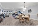 Living room featuring plenty of seating, a ceiling fan, and lots of space at 1352 Villa Marbella Ct. # 1-304, Myrtle Beach, SC 29572