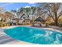 Beautiful backyard pool with a charming gazebo, perfect for outdoor relaxation and entertaining at 1800 Glenns Bay Rd., Surfside Beach, SC 29575