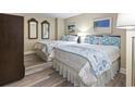 Comfortable bedroom featuring two queen beds with seaside themed decor and hardwood floors at 2301 S Ocean Blvd. # 1401, North Myrtle Beach, SC 29582