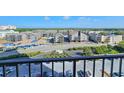 A balcony view of a condo community featuring multiple buildings and lush greenery at 9650 Shore Dr. # 706, Myrtle Beach, SC 29572