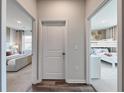 Hallway showcasing two bedrooms featuring neutral color schemes and modern furnishings at 1030 Laconic Dr., Myrtle Beach, SC 29588