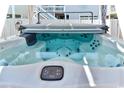 Relaxing hot tub with clear blue water and multiple jets, perfect for unwinding after a long day at 317 23Rd Ave. N, North Myrtle Beach, SC 29582