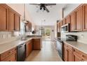 Traditional kitchen featuring wooden cabinets, modern appliances, and plenty of counter space at 401 Barton Loop, Myrtle Beach, SC 29579