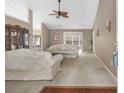 Bright living room featuring neutral walls, fan, carpet and comfortable furnishings at 401 Barton Loop, Myrtle Beach, SC 29579