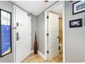 Entryway with decorative vase and view into adjacent bathroom at 4800 S Ocean Blvd. # 1514, North Myrtle Beach, SC 29582