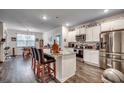 Modern kitchen featuring a large island with bar seating and stainless steel appliances at 583 Meadowgrass Ct., Myrtle Beach, SC 29588