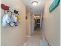 Hallway with tiled flooring and nautical-themed accents leading to other rooms at 1305 S Ocean Blvd. # 204, North Myrtle Beach, SC 29582