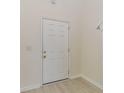 Bright entryway featuring a white door and neutral paint at 159 Chenoa Dr. # E, Murrells Inlet, SC 29576