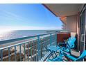 Relaxing oceanfront balcony with seating and breathtaking view of the beach and horizon at 1604 N Ocean Blvd. # 605, Myrtle Beach, SC 29577