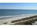 Beautiful wide beach with gentle waves, perfect for morning walks at 1605 S Ocean Blvd. # 612, Myrtle Beach, SC 29577