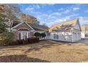 Charming one-story home featuring a brick facade, two-car garage and well-maintained landscaping at 1639 Coventry Rd., Surfside Beach, SC 29575