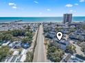 Aerial view of condo near the ocean, showcasing its proximity to local attractions at 351 Lake Arrowhead Rd. # 2-206, Myrtle Beach, SC 29572