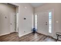 Inviting foyer with wood-look flooring and neutral paint, showcasing a bright and airy entrance at 477 Cane Branch Rd., Loris, SC 29569