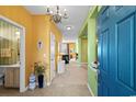 Bright foyer with tile floors and colorful walls, leading to living spaces at 5719 Whistling Duck Dr., North Myrtle Beach, SC 29582