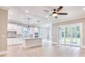 Spacious living area with wood floors and modern lighting fixtures at 641 Waterbridge Blvd., Myrtle Beach, SC 29579