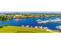 Beautiful aerial view of the waterfront and community featuring boats and a scenic waterway at 2151 Bridge View Ct. # 2-902, North Myrtle Beach, SC 29582