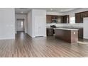 Spacious kitchen with stainless steel appliances, island, and granite countertops; open layout at 703 St. Albans Loop, Conway, SC 29526