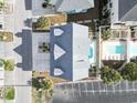 Overhead view of a home with pool, deck, and driveway, showcasing layout and outdoor spaces at 119 Sunset Dr., Murrells Inlet, SC 29576