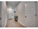 Bright entryway featuring wood-look flooring, white doors, and neutral wall paint at 1527 Swing Bridge Way, Myrtle Beach, SC 29588