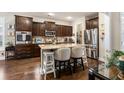 Stylish kitchen with granite countertops, stainless steel appliances, and breakfast bar seating at 2122 Silver Spring Ln., Myrtle Beach, SC 29577