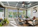 Inviting screened-in porch with comfortable seating, perfect for enjoying outdoor relaxation at 2122 Silver Spring Ln., Myrtle Beach, SC 29577