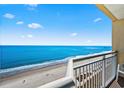 Breathtaking ocean view from the balcony, with white railings and a clear blue sky at 2501 S Ocean Blvd. # 1103, Myrtle Beach, SC 29577