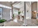 Inviting foyer with high ceilings and a chandelier, adjacent to an elegant dining area at 257 Leste Rd., Myrtle Beach, SC 29588