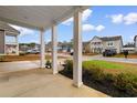 Inviting front porch view of the neighborhood showcasing manicured lawns and charming homes at 1043 Harbison Circle, Myrtle Beach, SC 29579