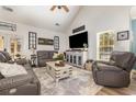 Cozy living room with vaulted ceilings, comfortable seating, and a decorative coffee table at 2724 A C Ln, Conway, SC 29526